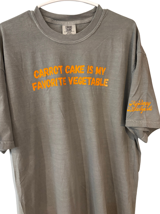 Gray Carrot Cake Tee on a hanger with orange lettering and sleeve logo